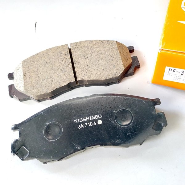 Колодки тормозные передние Nisshinbo PF3369/NP3012